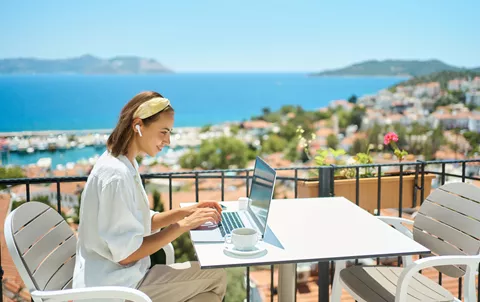 202504_professional-working-remotely-with-view_getty.jpg